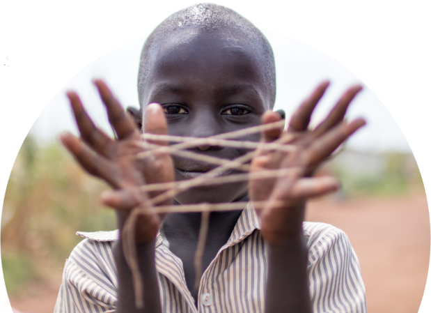 Child playing with string